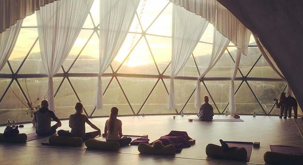 Sunset yoga class in the Om Dome at Suryalila